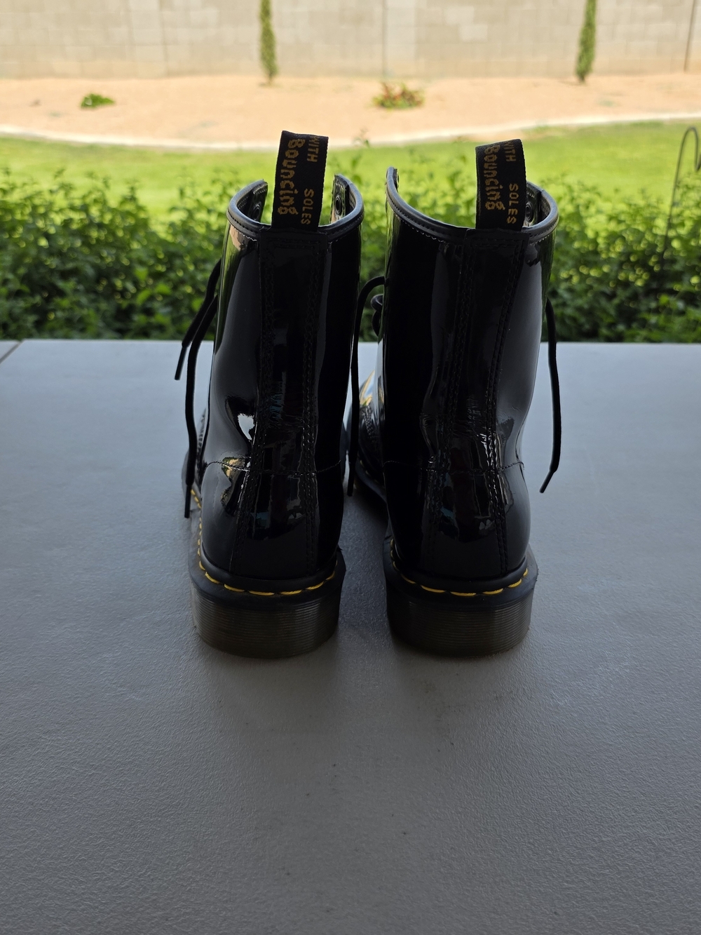 Dr. Martens Black Patent Lace-Up Boots with Yellow Stitching - Picture 4 of 5